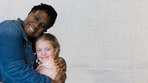 Joy hugging youth